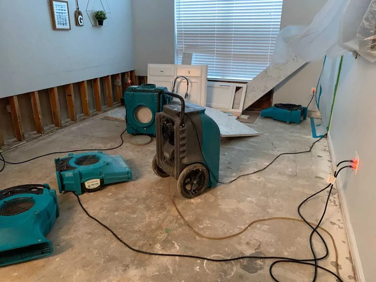Dehumidifier in flood-cut room for Water Damage Restoration in Berkley